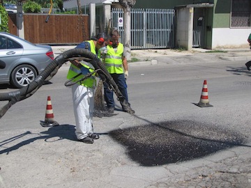 macchinario per chiusura buche03